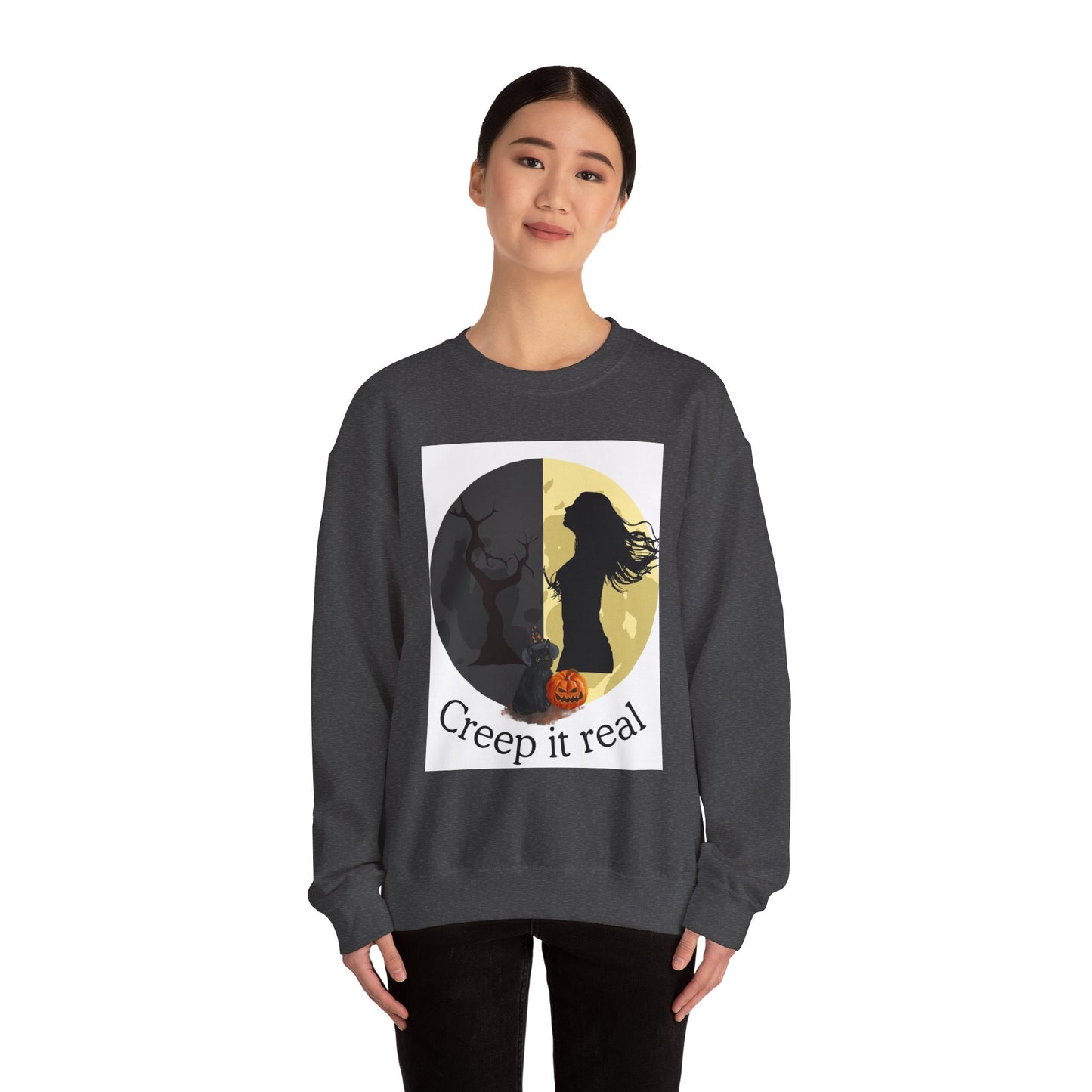 Person wearing a dark gray sweatshirt with a graphic design and text on a white background