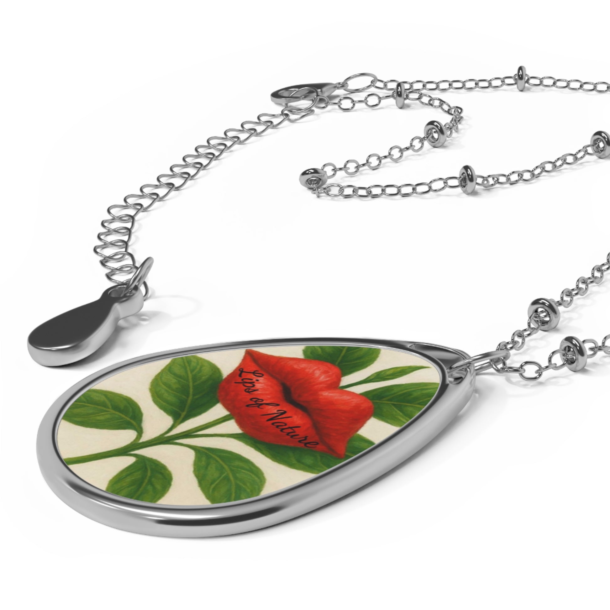 Necklace with a pendant featuring a red flower design on a white background