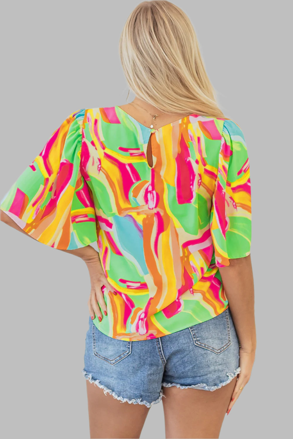 multicolour abstract print blouse, back side view